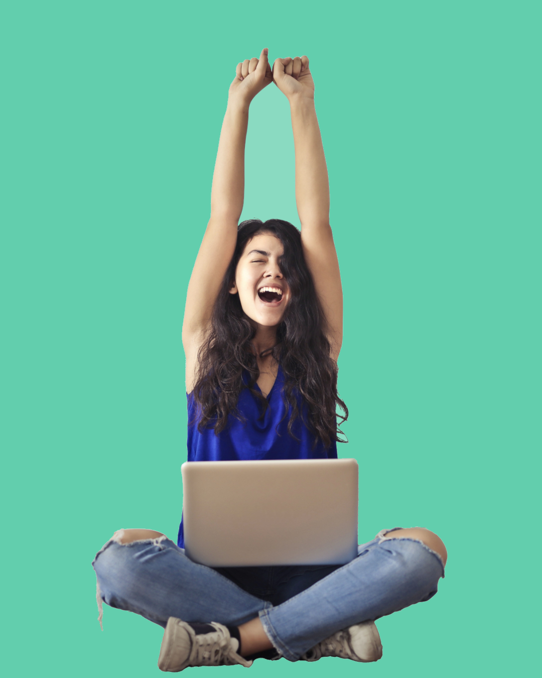 Young woman celebrating on a laptop